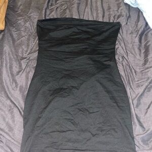 Strapless black bodycon dress with open back